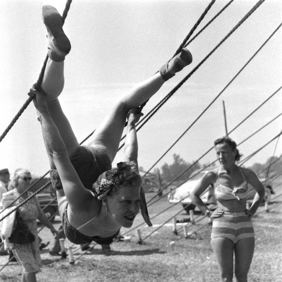 Life Visits the Circus in Florida- Acrobats clowning around on ropes